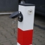 Foldable parking post with lock